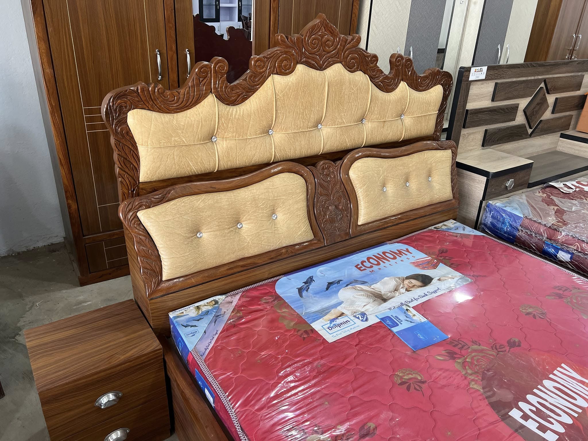 Wooden bed frame with Royal design alogn with drawers, showroom